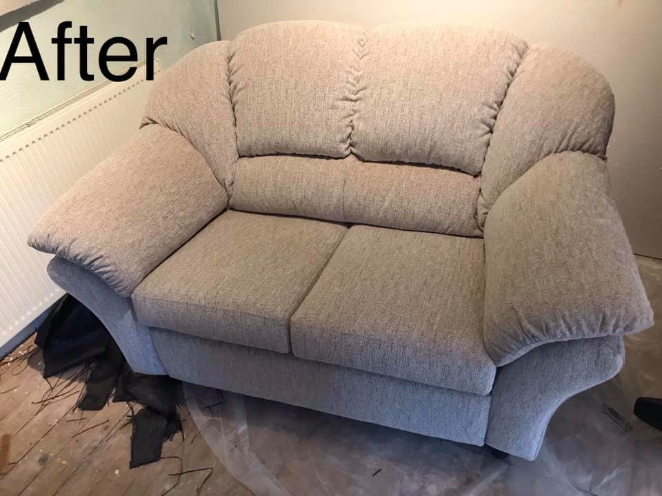 Small cream coloured sofa