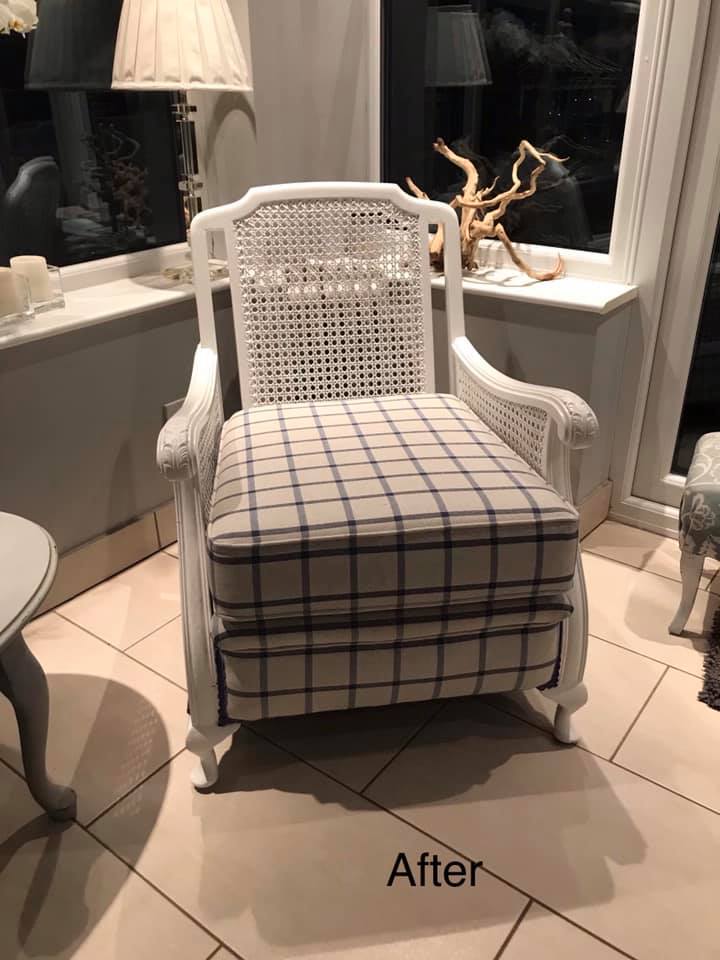 Armchair in a corner with striped upholstery