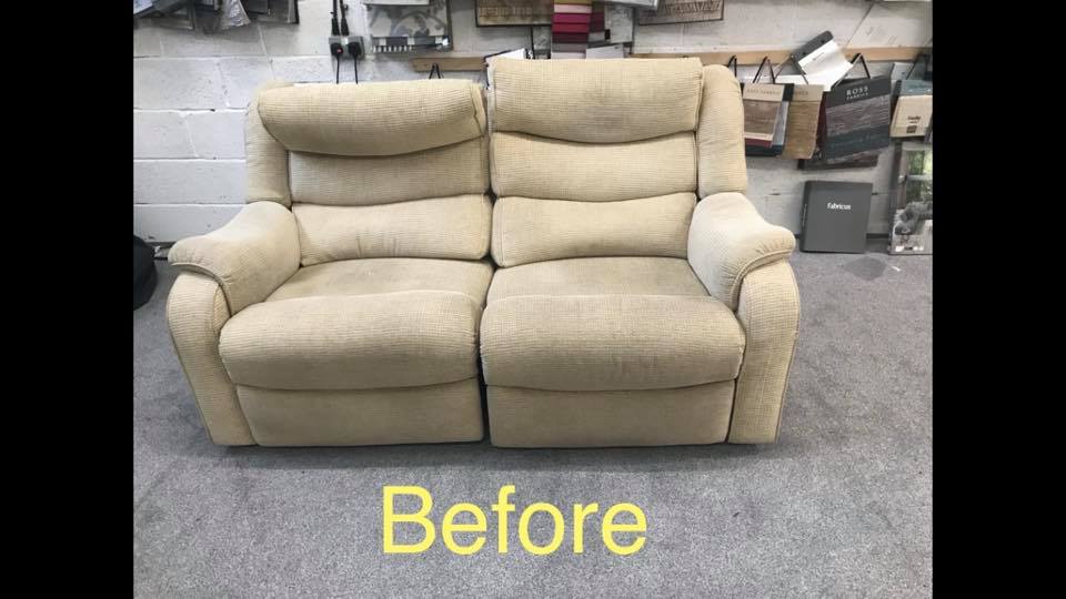Old and misshapen light coloured sofa