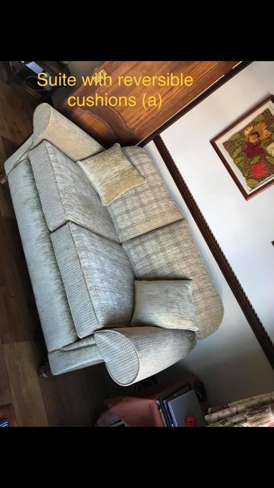View of a light coloured sofa in a room