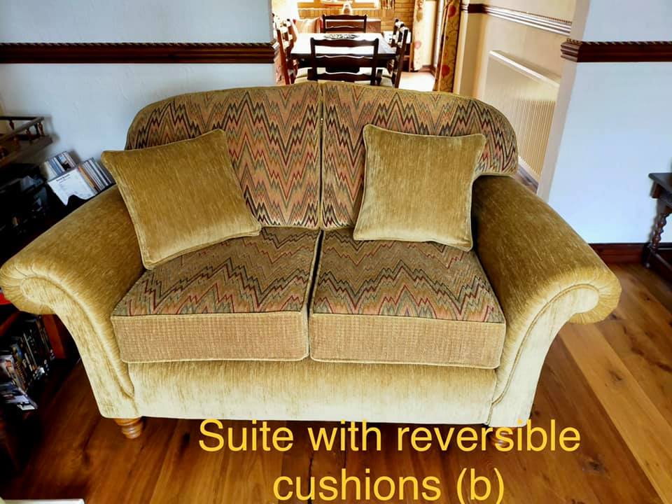 Neutral coloured patterned sofa with cushions