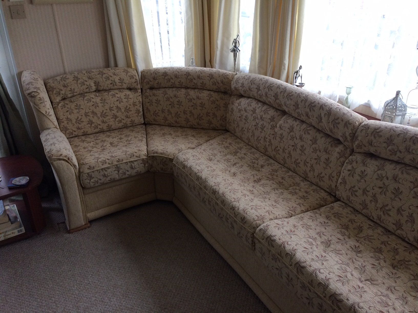 Corner set next to window