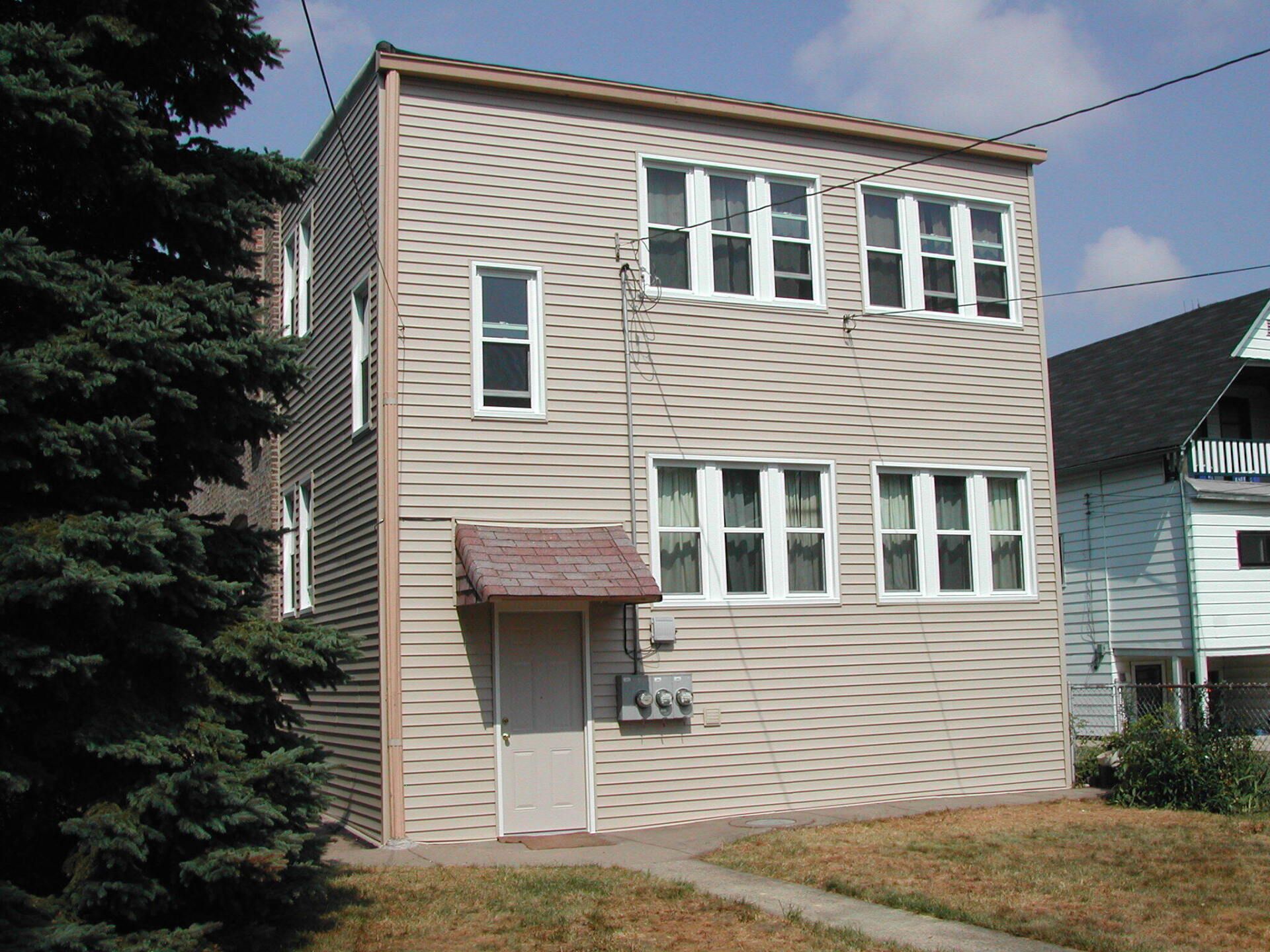 A building with a lot of windows and a door