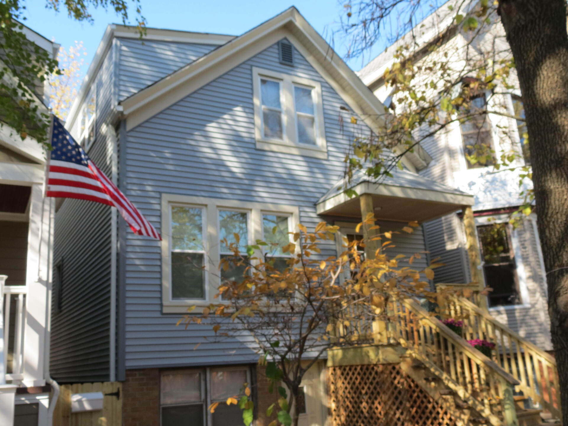 A house with an american flag on the side of it