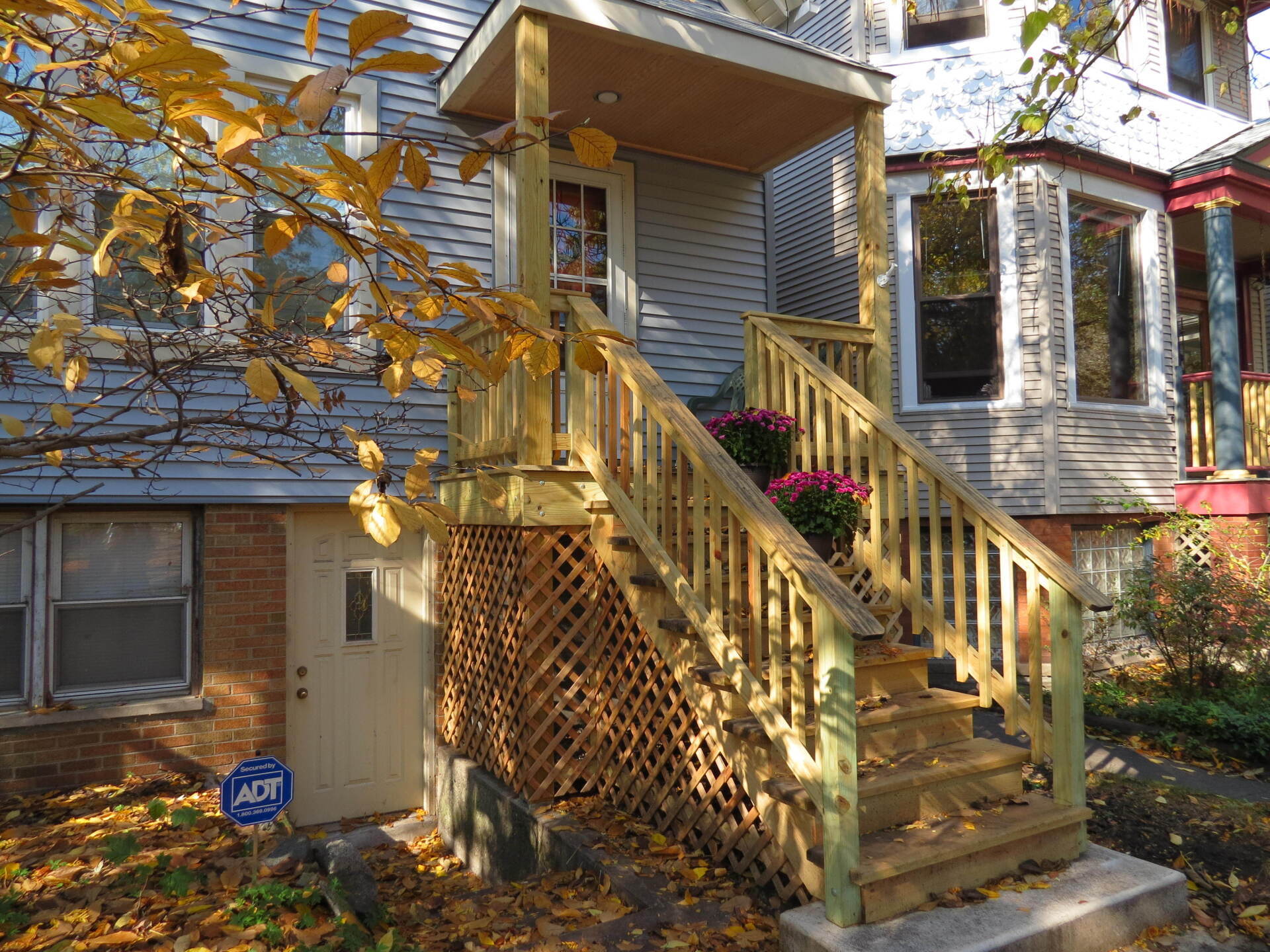 A house with a wooden porch and stairs