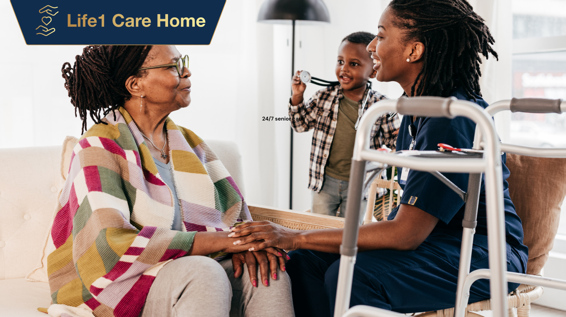 Woman and caregiver holding hands, a child smiles in the background, walker nearby.
