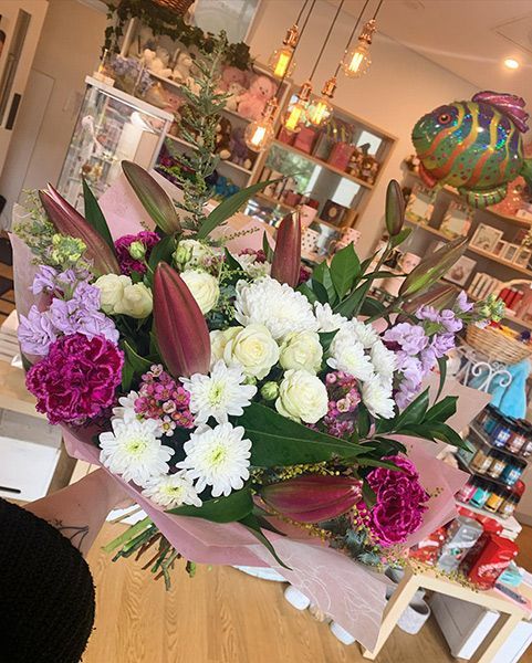 A Large Bouquet Is Sitting on A Table in A Store — Ivy Lane Flowers & Gifts in Nambour, QLD