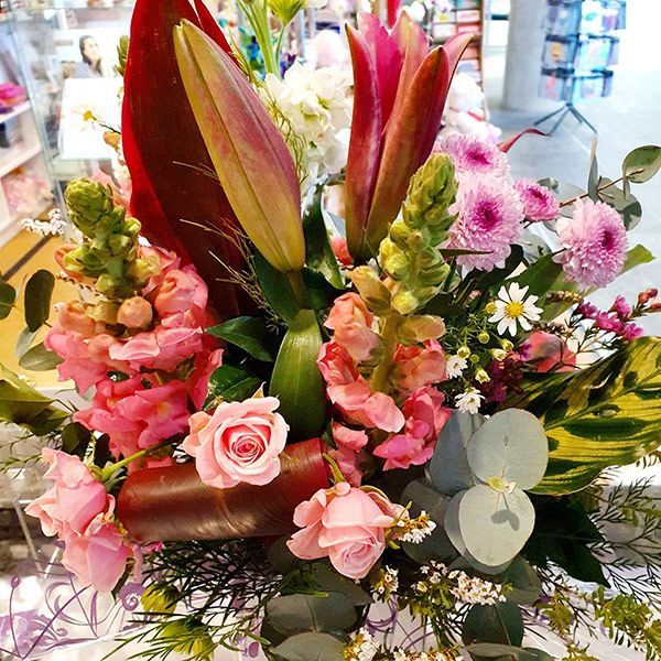 A Close up Of a Bouquet of Pink Flowers on A Table — Ivy Lane Flowers & Gifts in Buderim, QLD