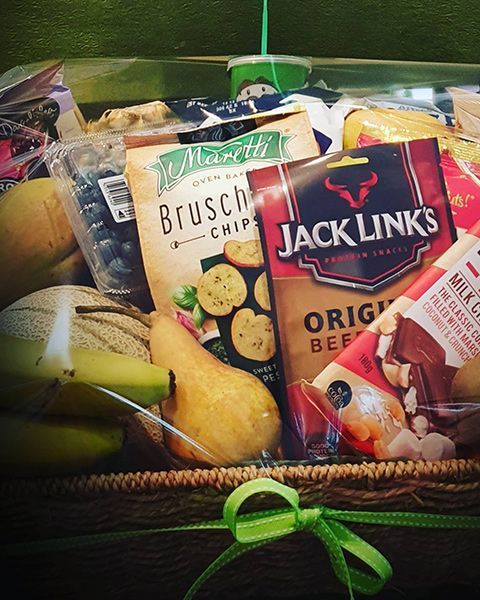 A Basket Filled with Fruits and Snacks — Ivy Lane Flowers & Gifts in Nambour, QLD