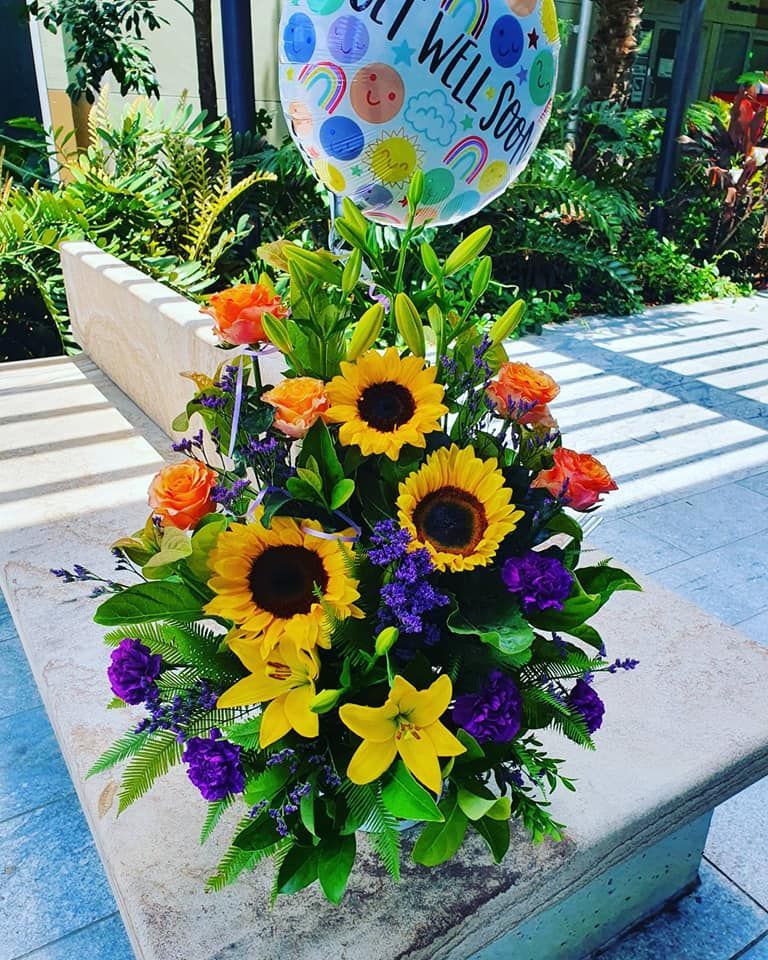 A Bouquet of Flowers with A Balloon that Says Get Well Soon — Ivy Lane Flowers & Gifts in Caloundra, QLD