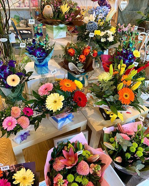 There Are Many Different Types of Flowers on The Table — Ivy Lane Flowers & Gifts in Birtinya, QLD