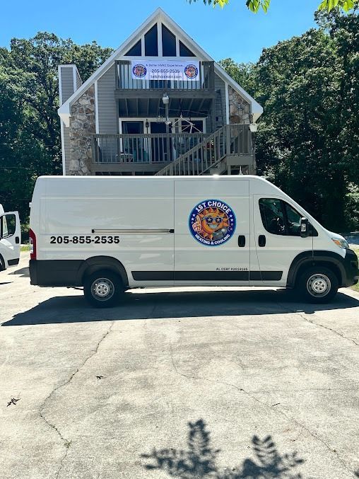White service van parked in front of a building with a banner; phone number 205-555-2525 visible.