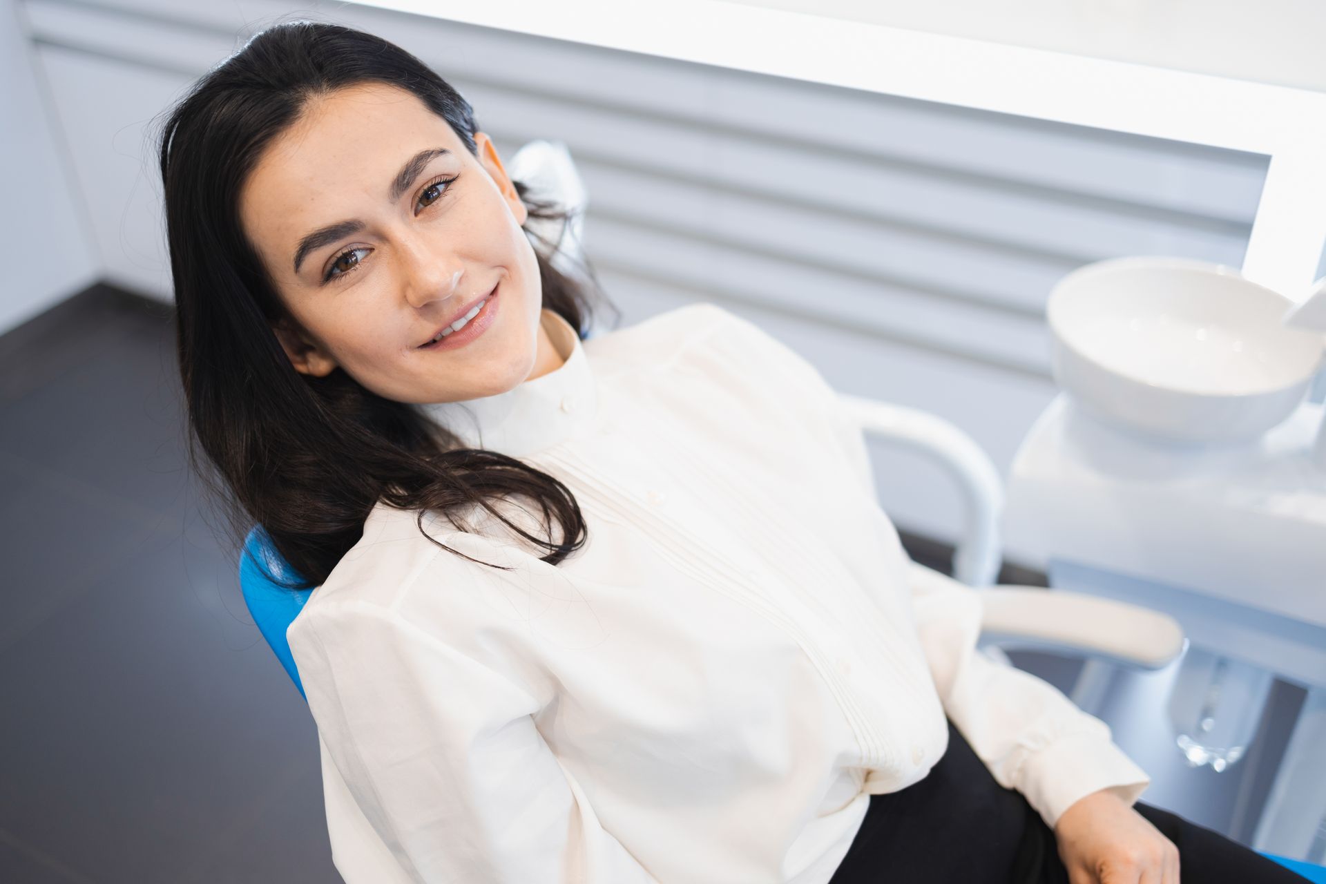 woman smiling after oral microbiome testing in Somerset, NJ