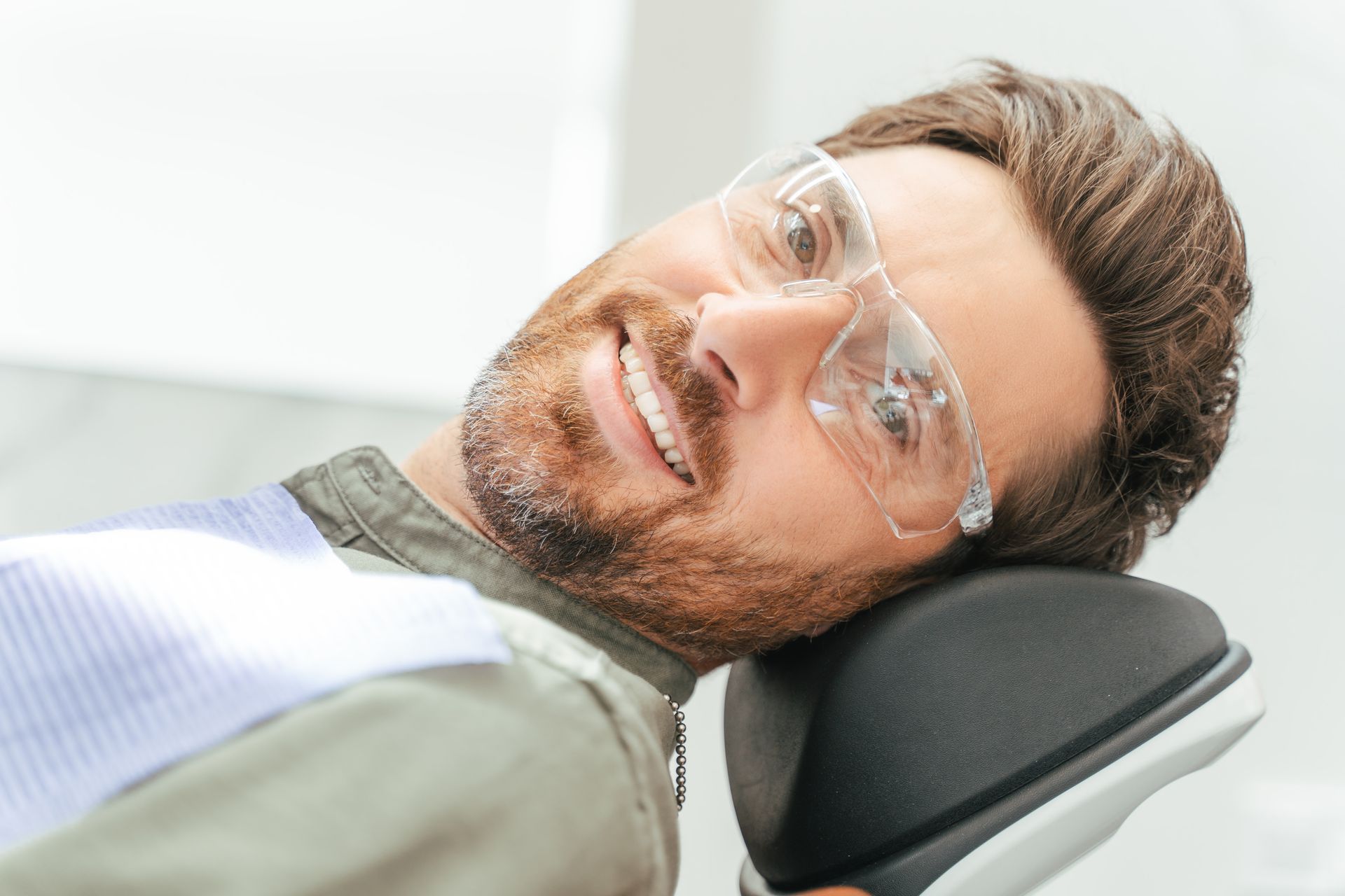 Man smiling after hearing the benefits of ozone therapy for gum disease | Somerset NJ Dentist