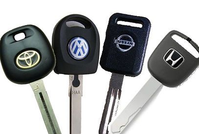 A group of car keys including toyota nissan and honda