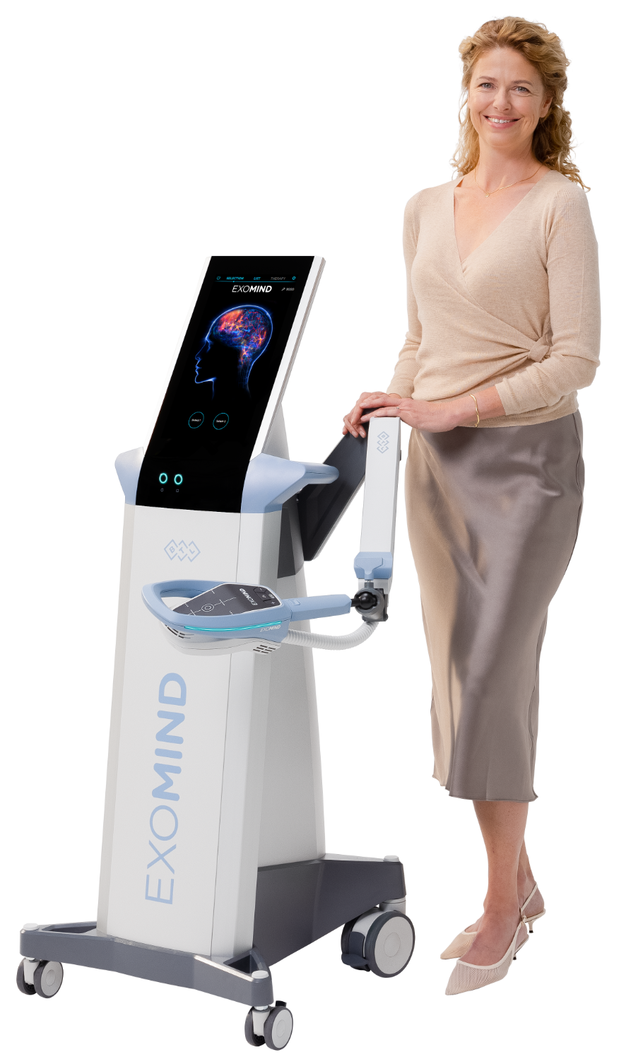 A woman stands beside an Exomind medical imaging device featuring a touchscreen display of a brain model.