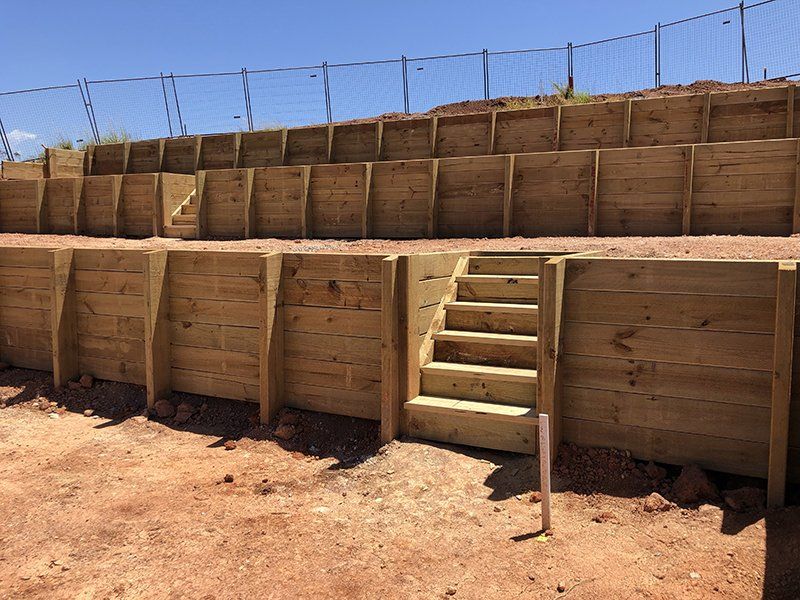 Retaining Wall With Landscaping — Timber Fencing in Temagog, NSW