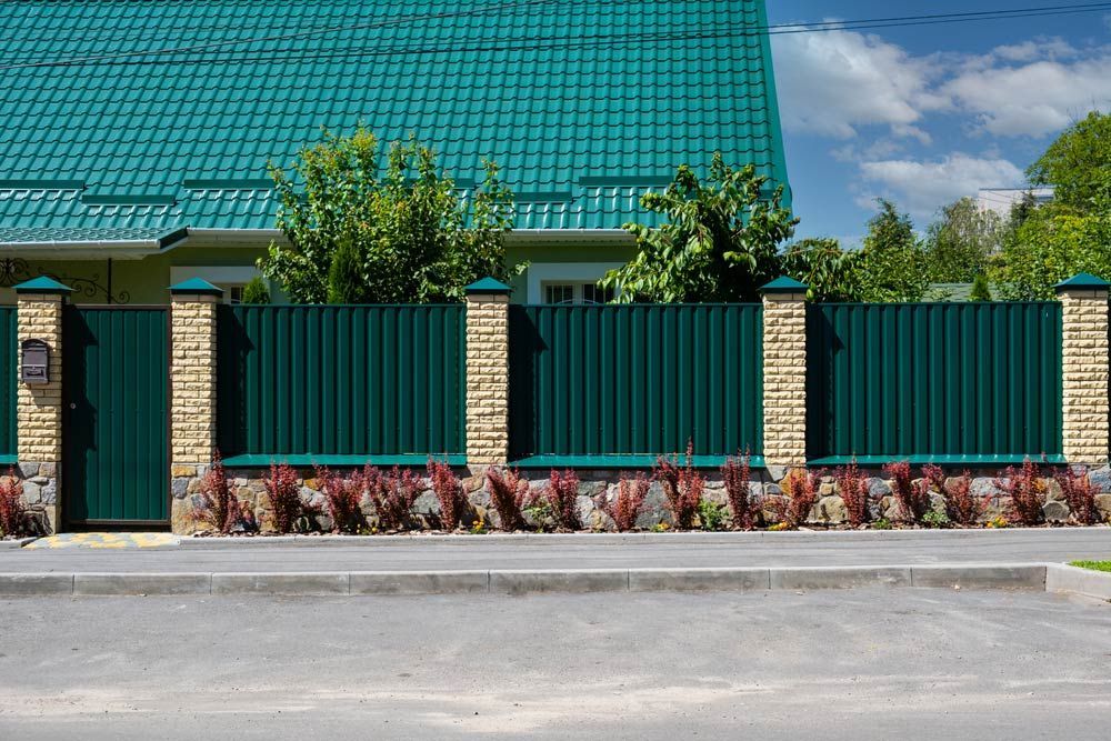 Green Metal Fence — Fencer in Port Macquarie, NSW