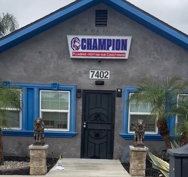 A house with a sign that says champion on it