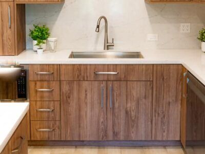 wooden kitchen cabinets with white countertops