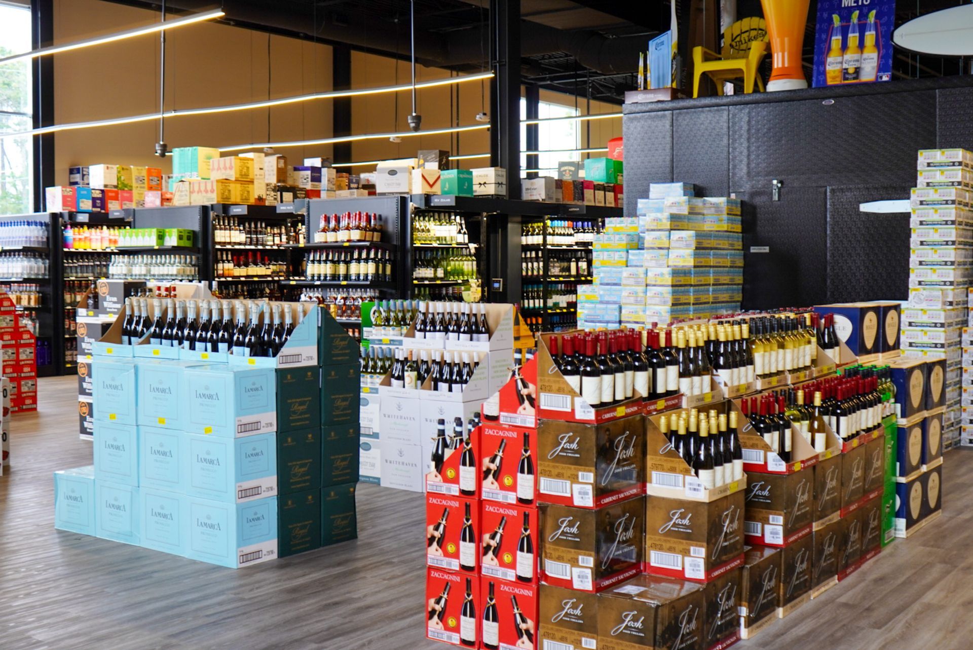 A grocery store filled with lots of bottles of wine and beer.