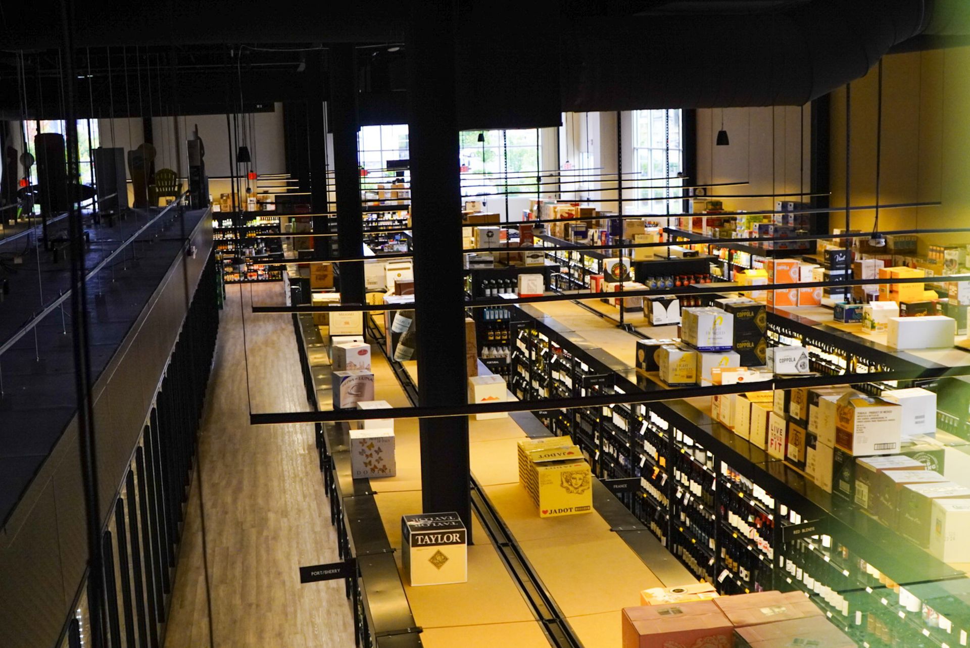 A large warehouse filled with lots of boxes and shelves