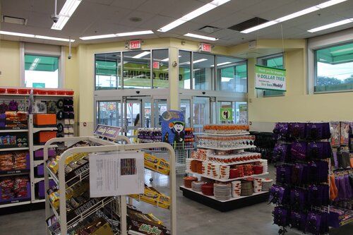 The inside of a store filled with lots of shelves and displays.