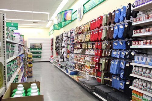 A grocery store aisle filled with lots of products