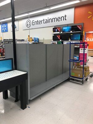 A store with a sign that says entertainment on it