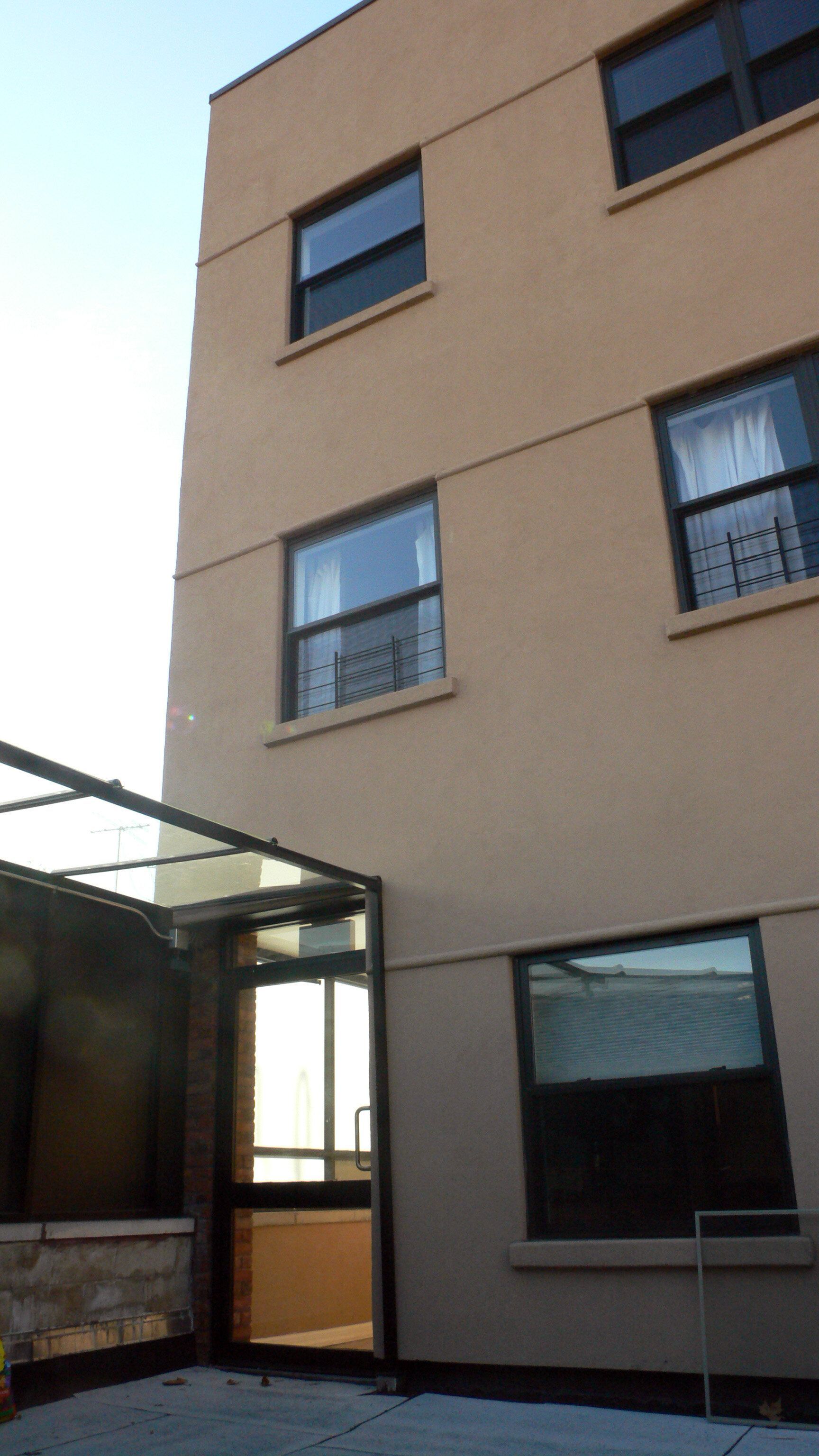 A building with a lot of windows and a door