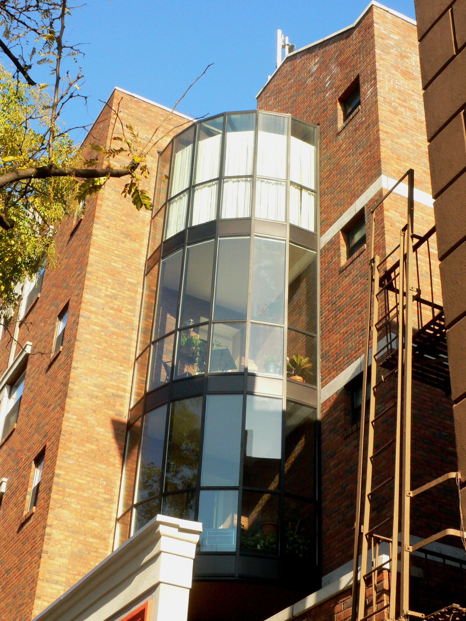A building with a lot of windows and a fire escape
