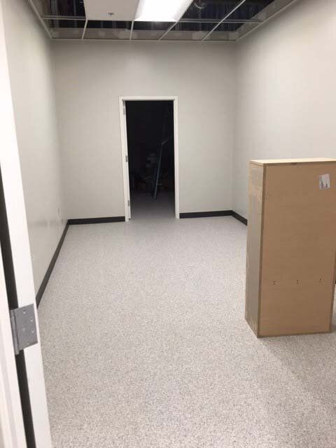 There is a cardboard box in the middle of the room.