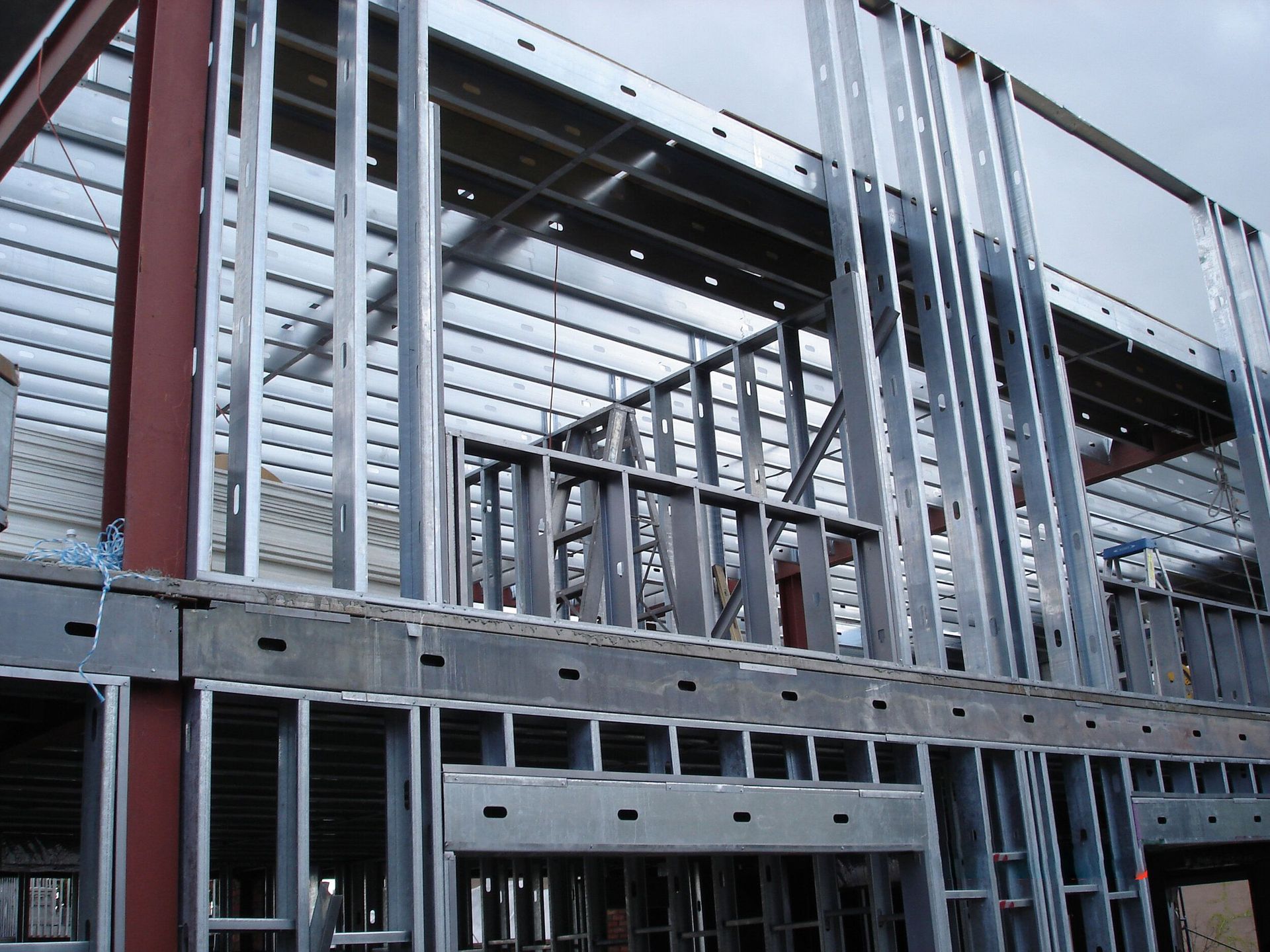A building under construction with a lot of metal frames