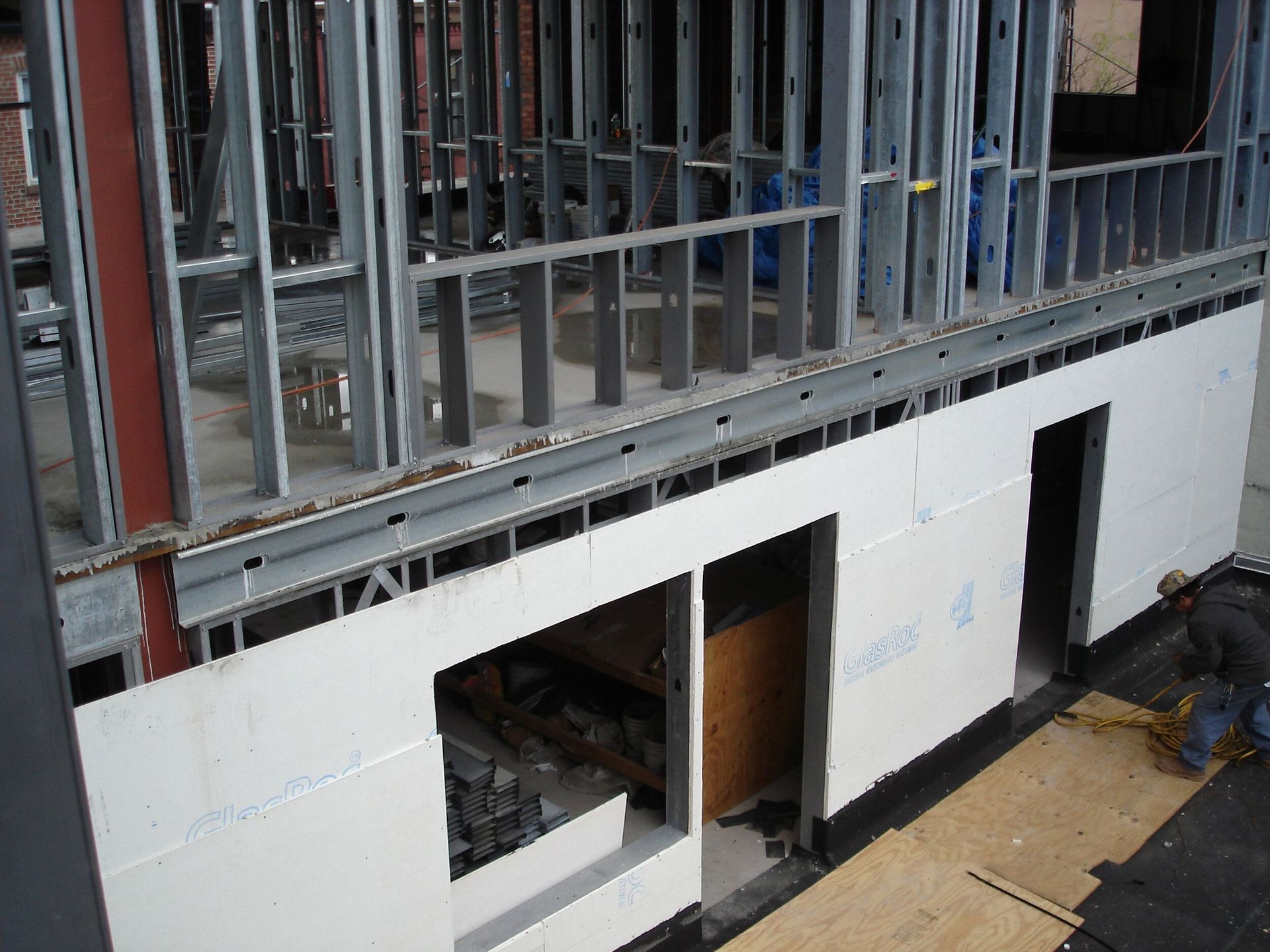 A building that is being built with white walls