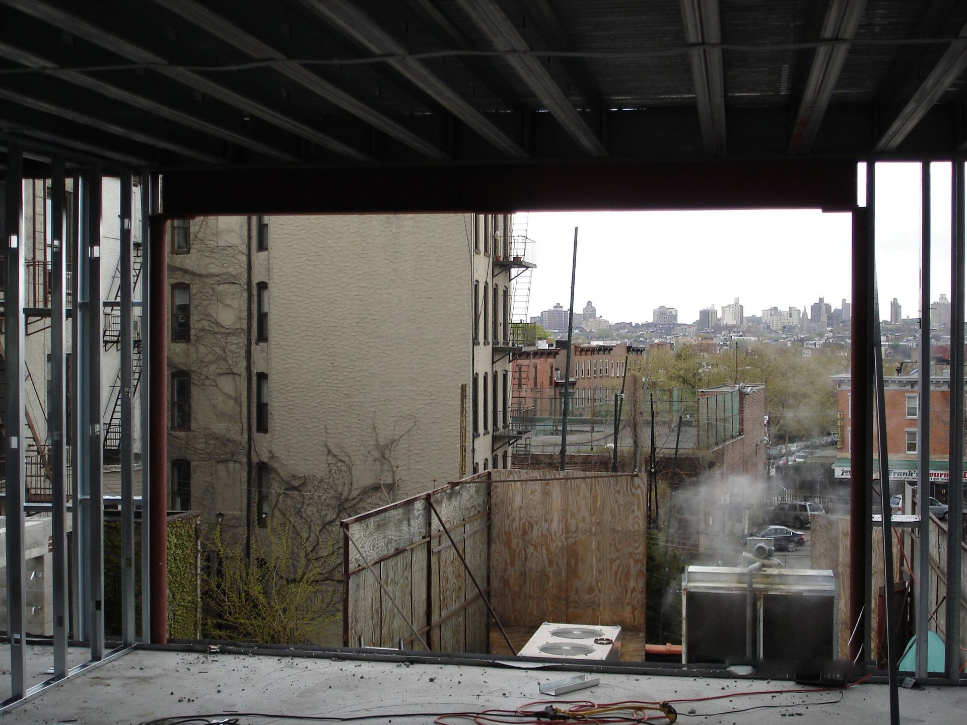 A view of a city from a building under construction