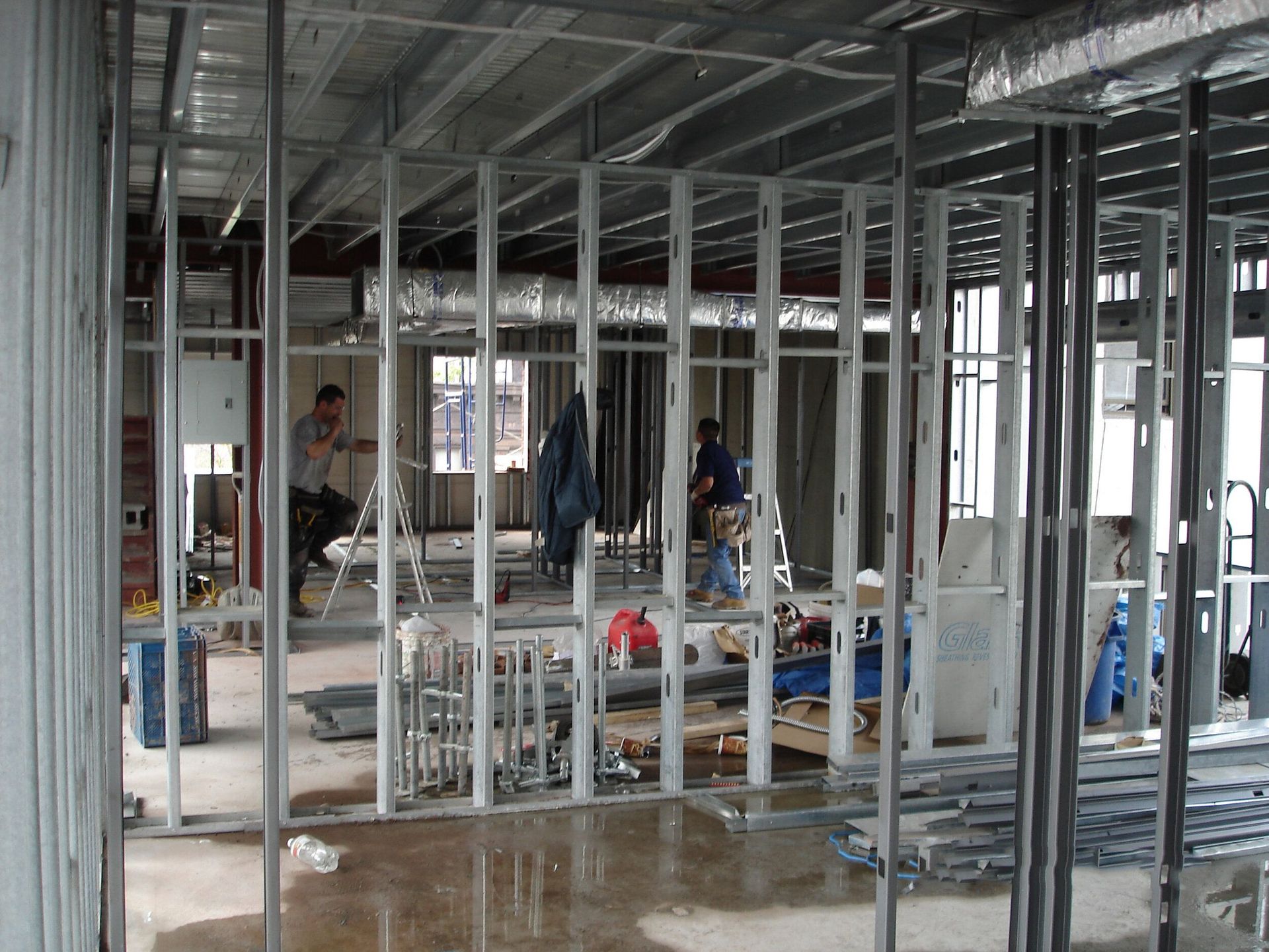 A building under construction with a lot of metal frames