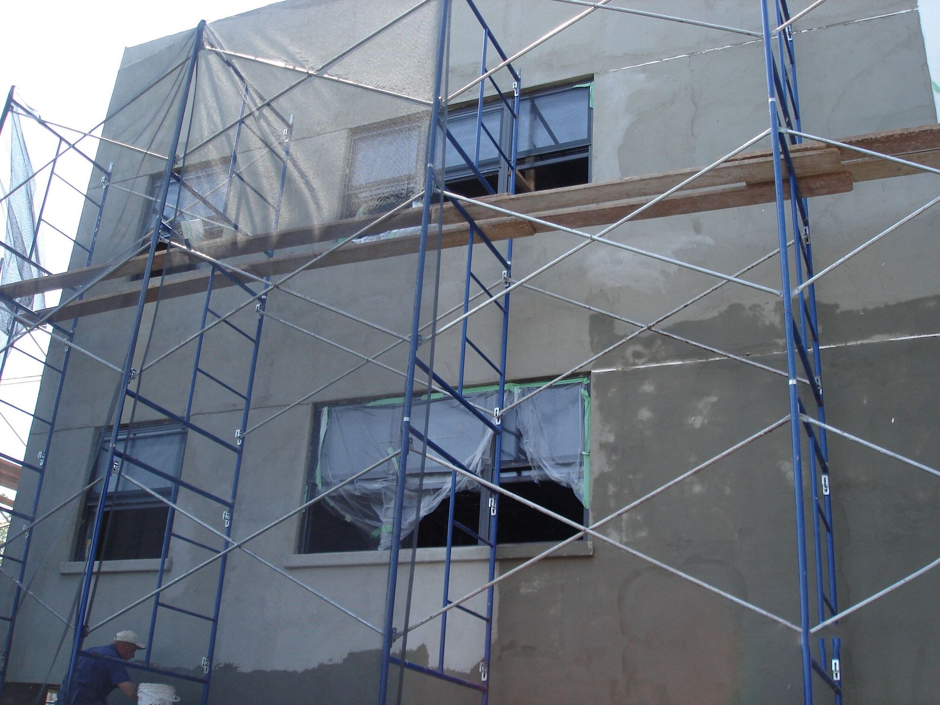 A building under construction with scaffolding around it