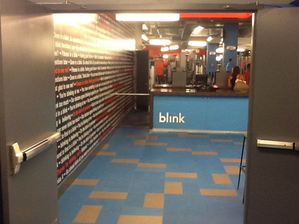 A gym with a counter that says blink on it