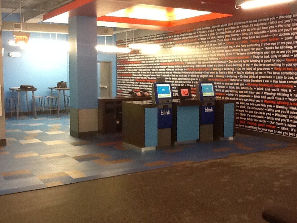 A room with a wall that has a lot of words on it