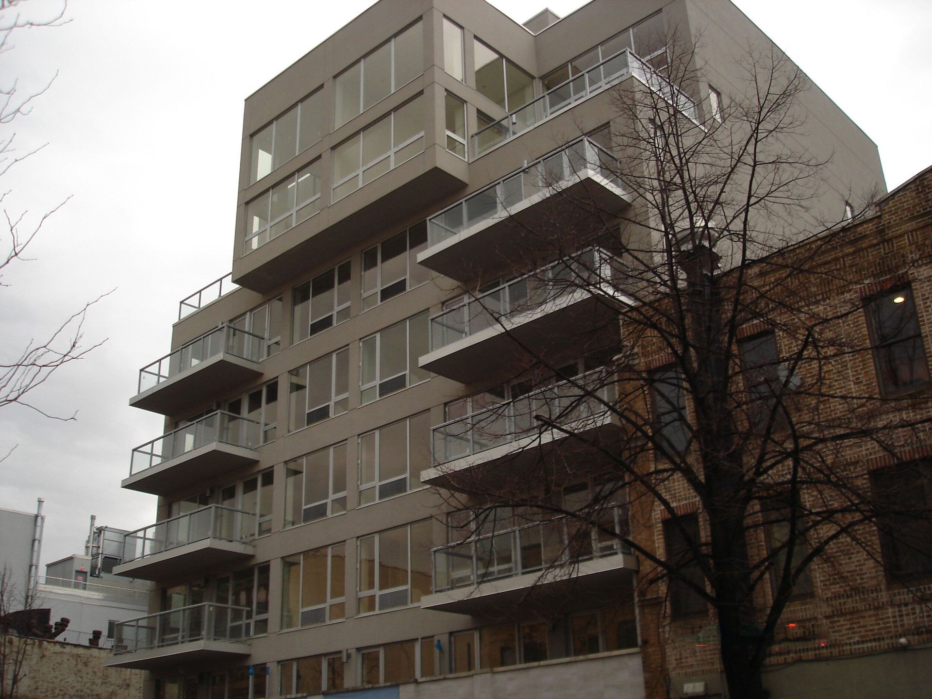 A large building with a lot of windows and balconies