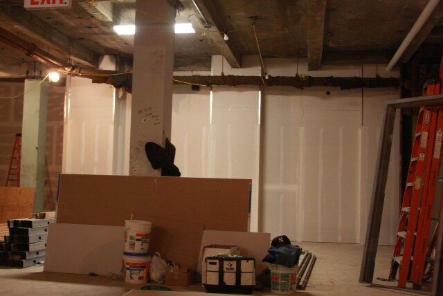 A room with a sign that says exit on it