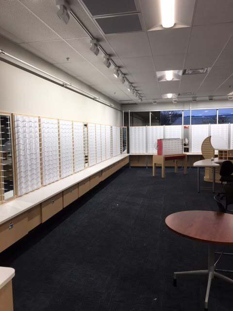 A large room with a lot of glasses on the wall
