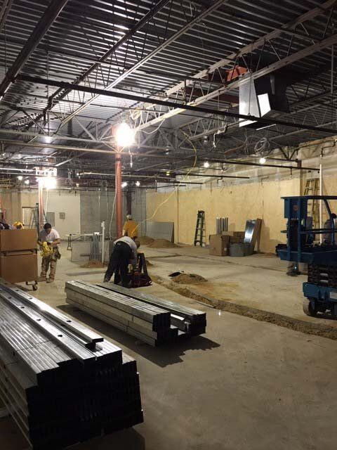 A large room with a lot of metal pieces in it