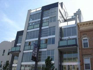 A large building with lots of windows and balconies