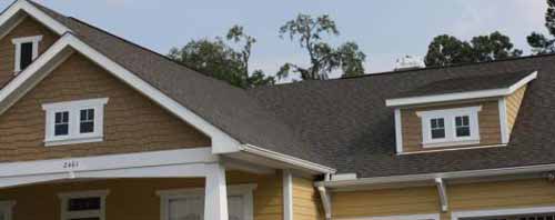 Yellow House with New Roof — Roofing in Tallahassee, FL