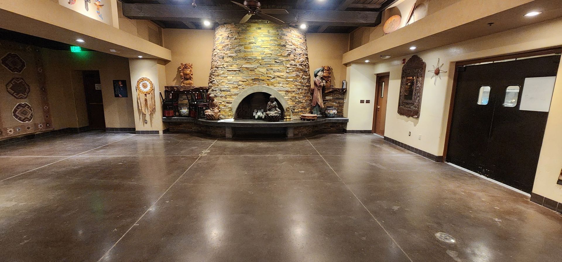 There is a fireplace in the middle of the room.