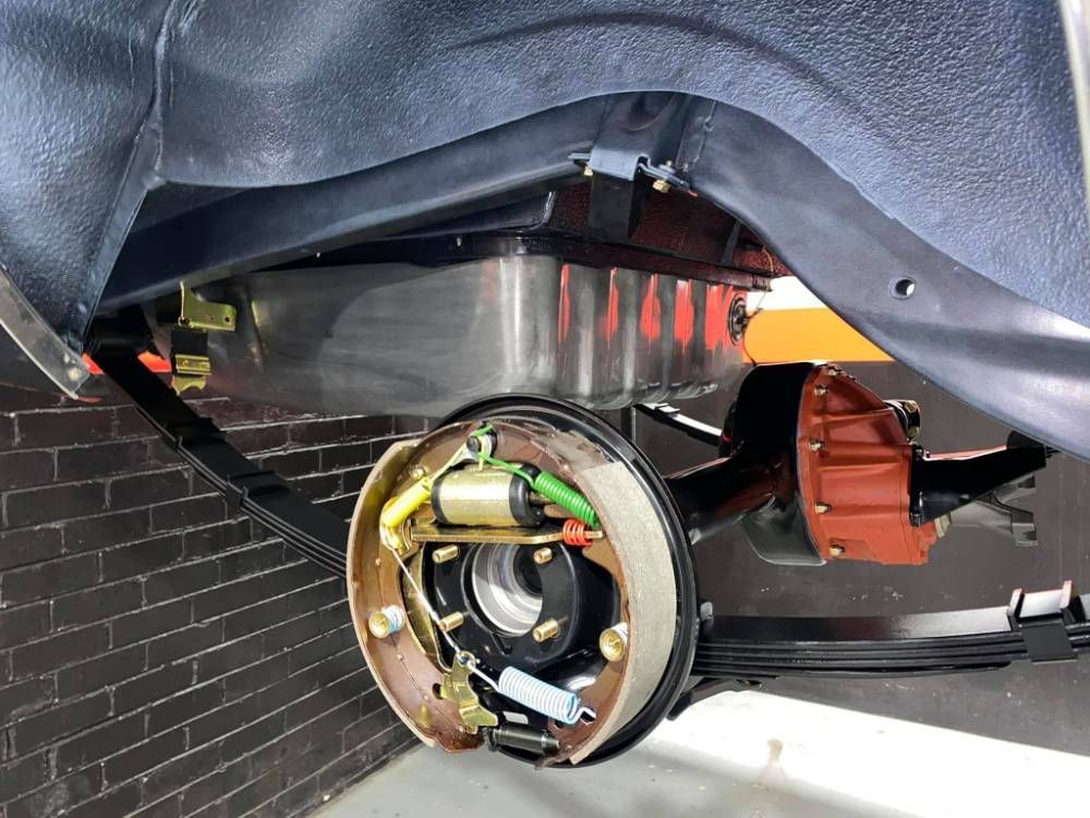 Two Metal Cylinders Connected by a Second Metal Cylinder — Genuine Falcon GT Parts in Sydney, NSW