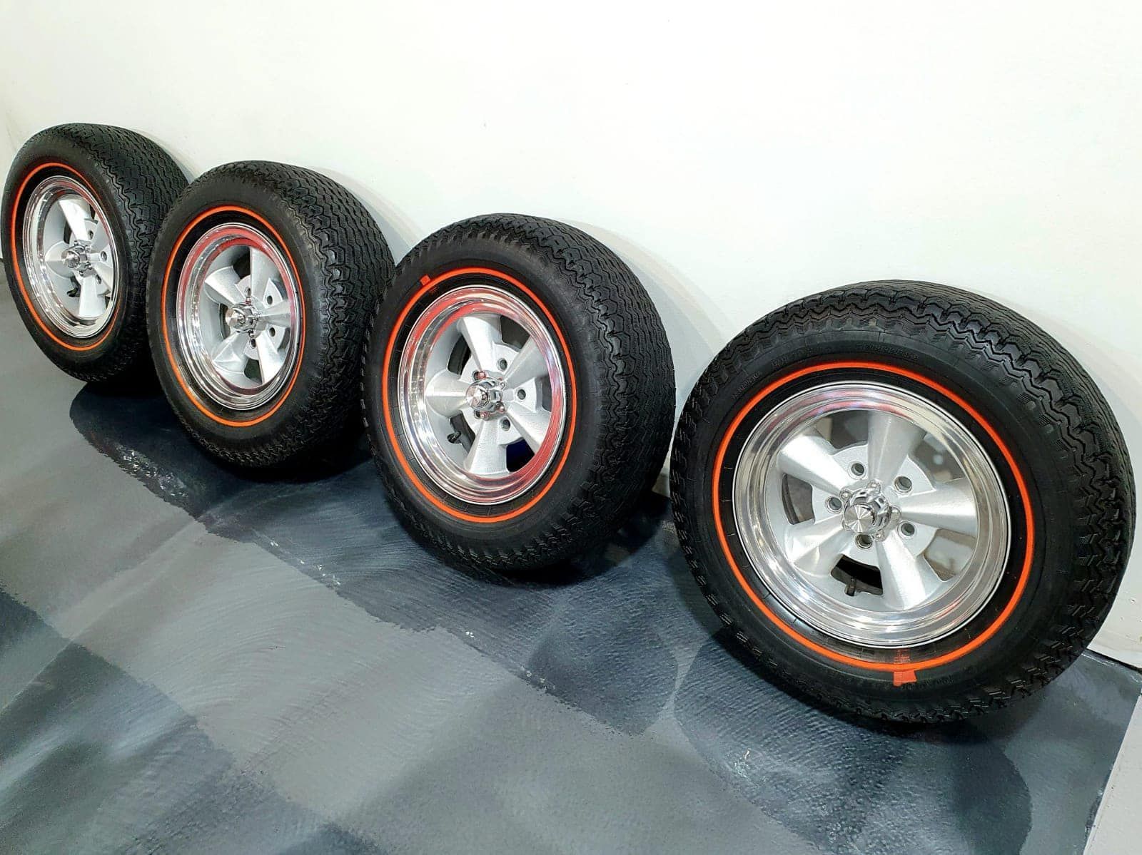 A Row of Tires With Rims — Restore Your Ford Falcon GT From Brisbane, NSW