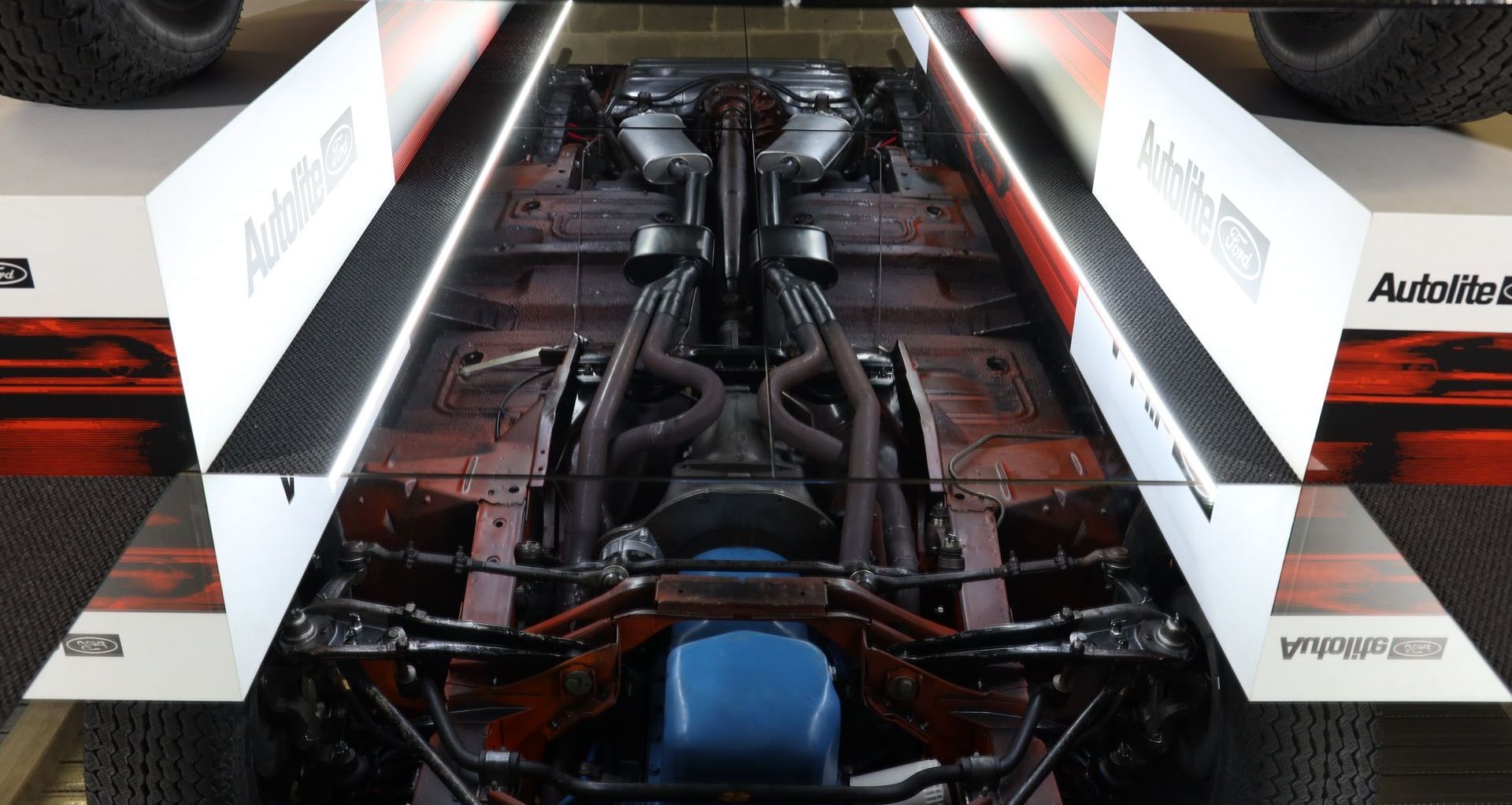 A Blue Car With Its Hood Open With the Engine Out Side — Original Maintained Falcon GT Restorations in Sydney, NSW