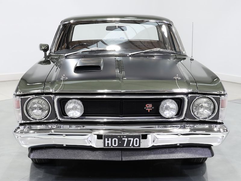 A Red Car Parked in a Garage — About Falcon GT Restorations in Sydney, NSW
